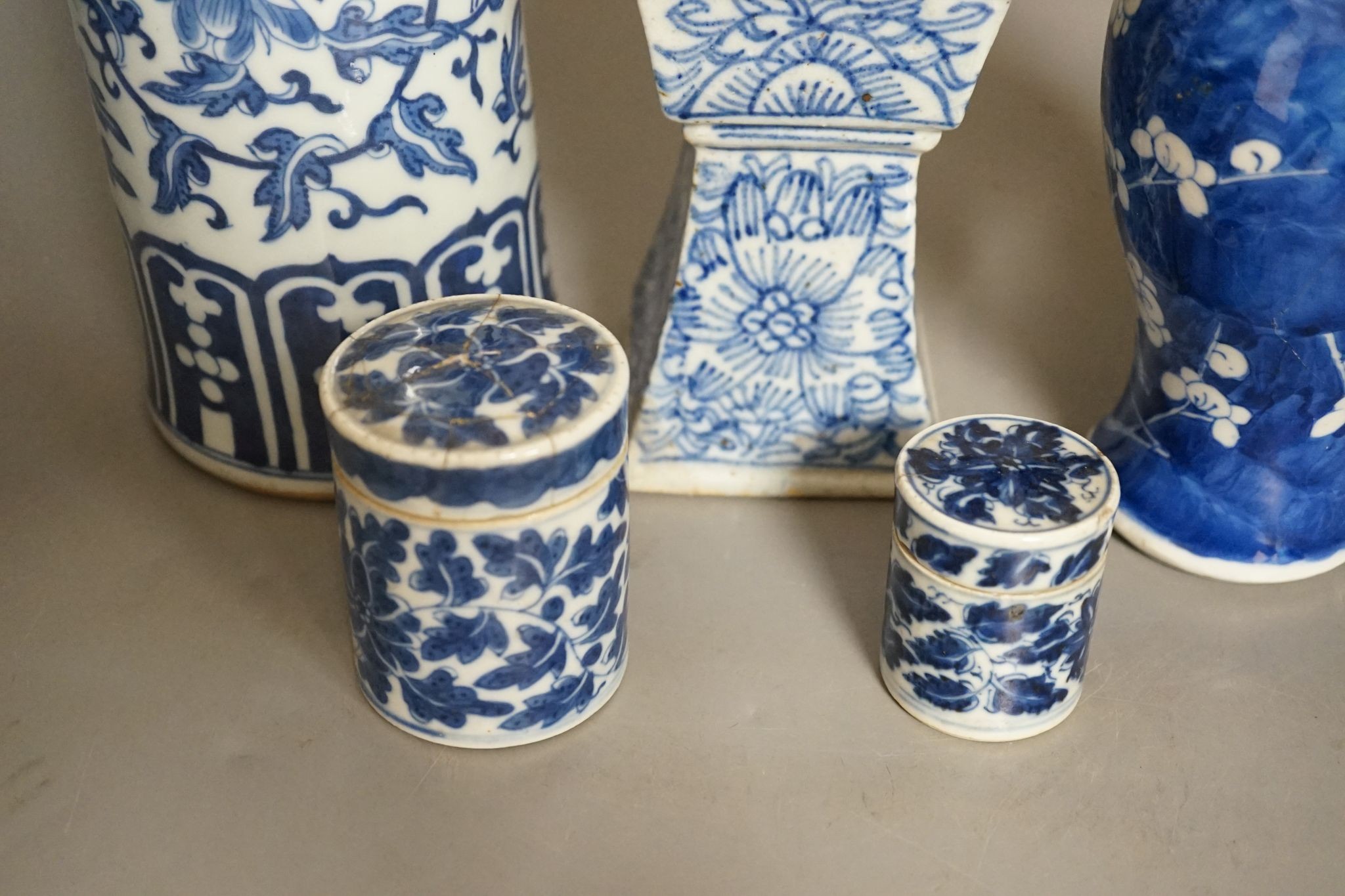 A group of 19th century Chinese blue and white vases, tallest 38.5cm, pots and a candlestick (5)